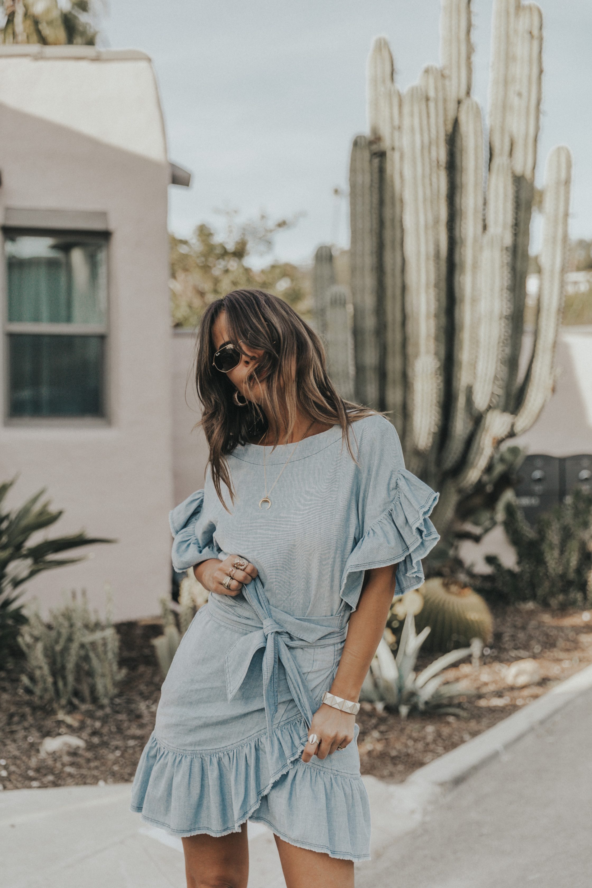 Sara of Collage Vintage wearing a Isabel Marant ruffled denim dress