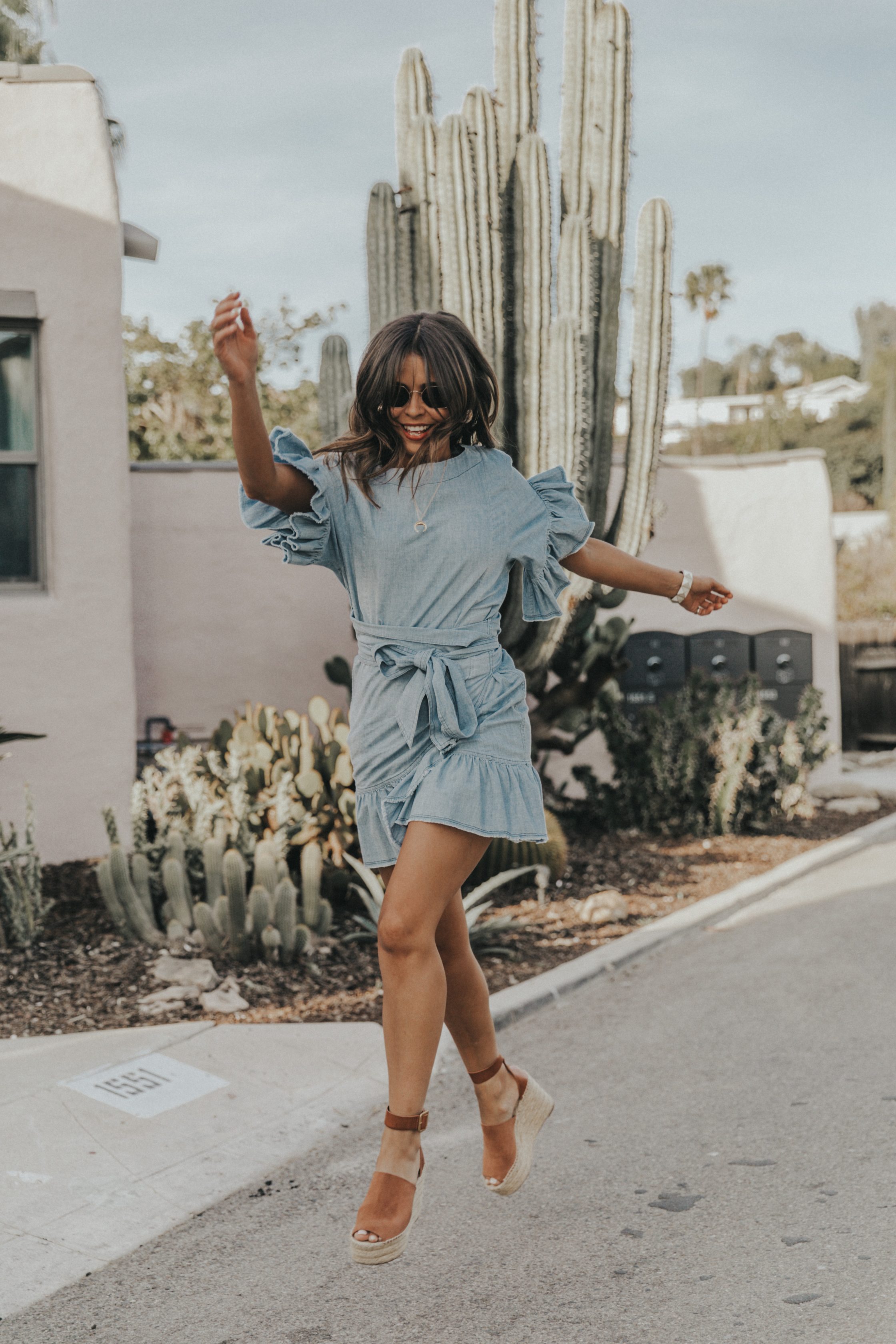 Sara of Collage Vintage wearing a Isabel Marant ruffled denim dress