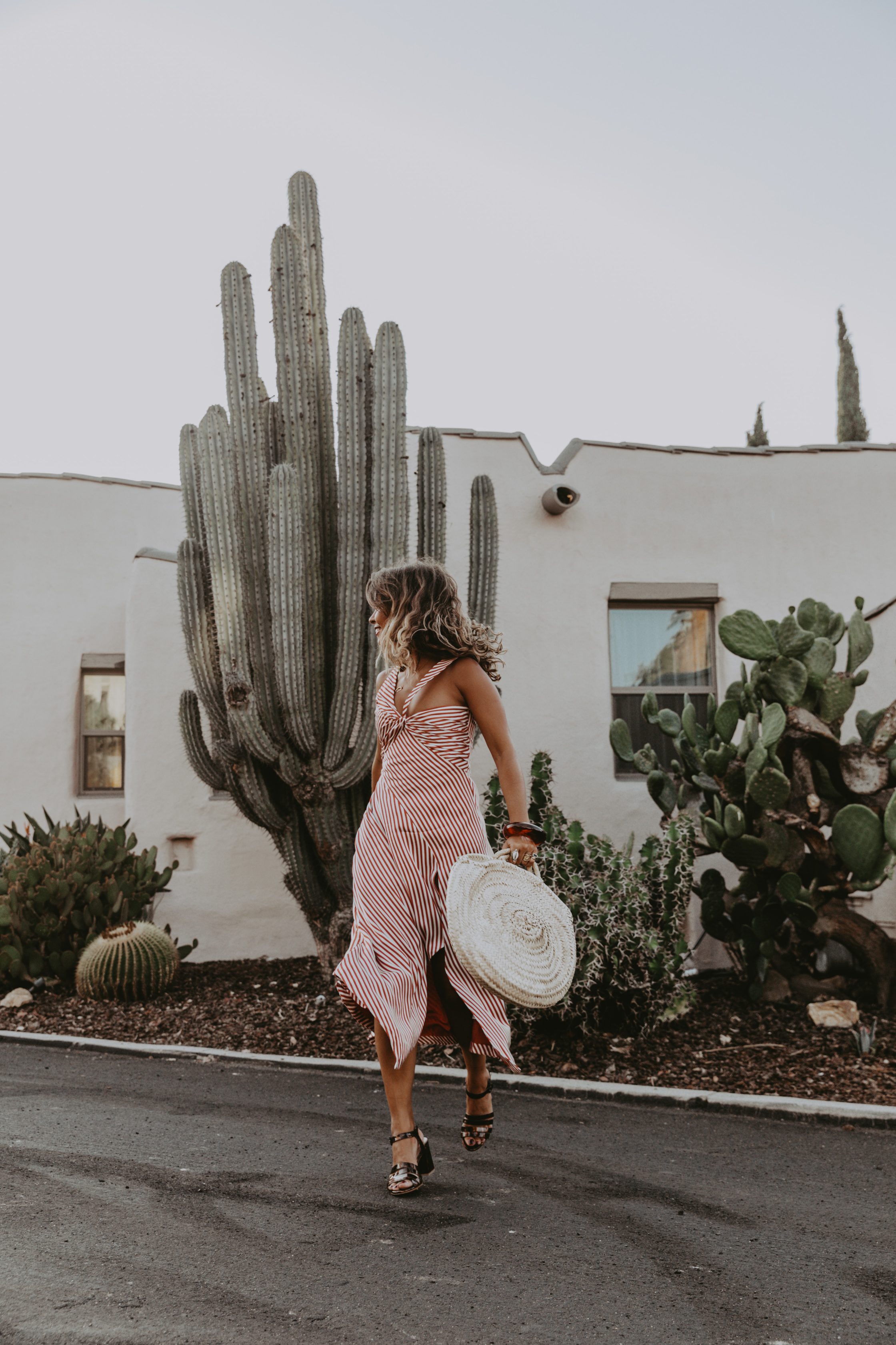 Sara Escudero for Collage Vintage is wearing a Jonathan Simkhai striped dress