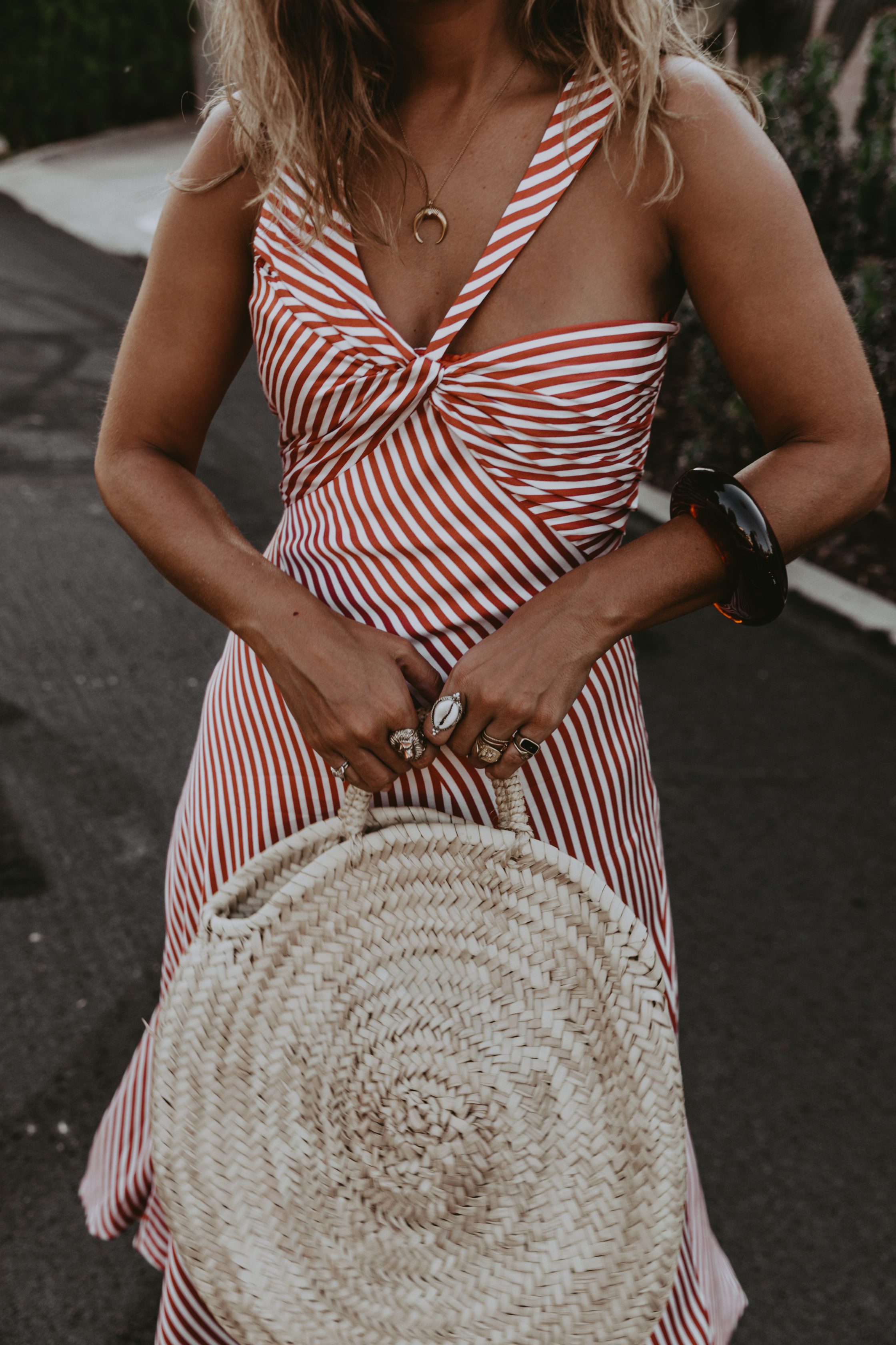 Sara Escudero for Collage Vintage is wearing a Jonathan Simkhai striped dress