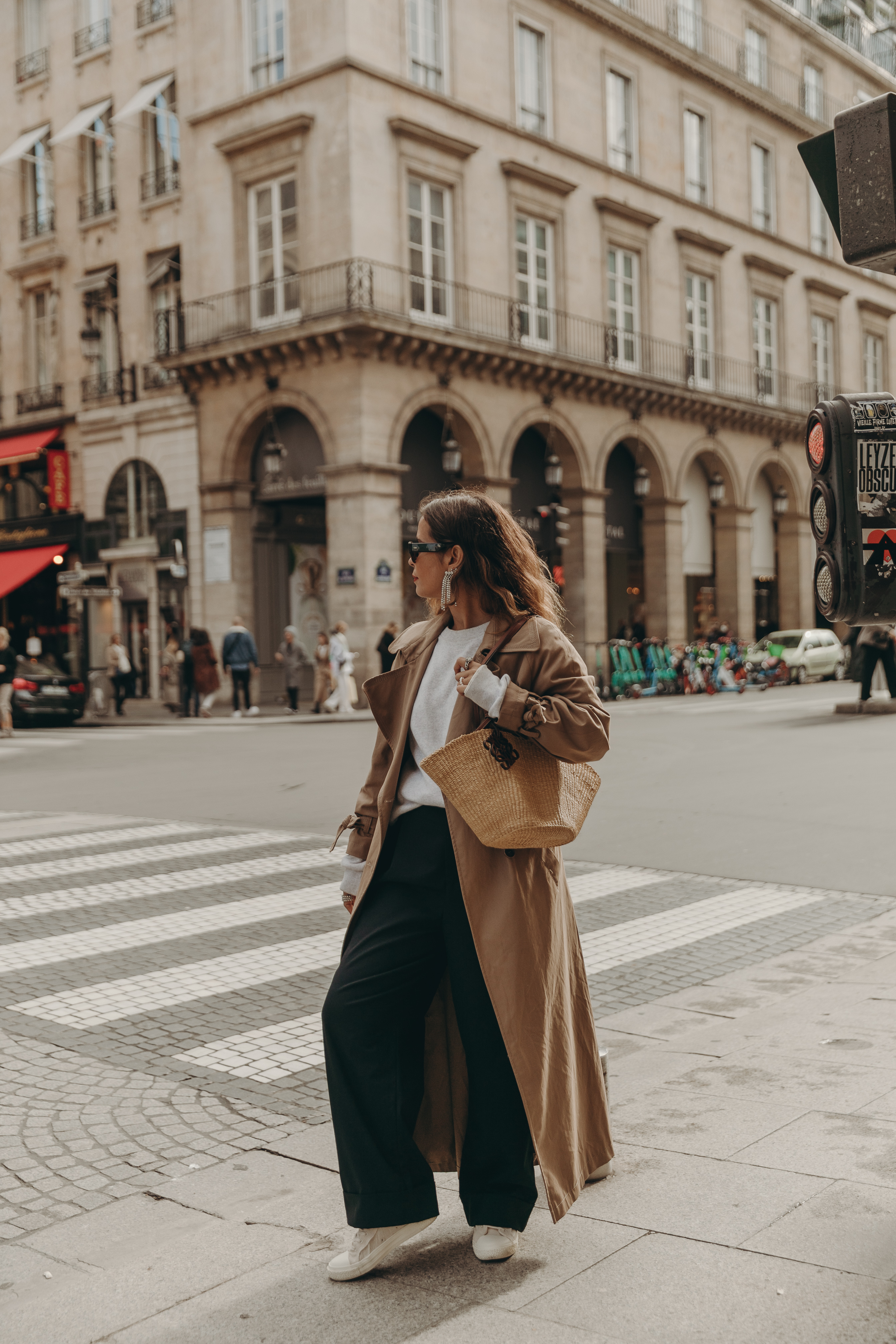 Casual look wearing trench coat, sweatshirt and sneakers. Collage Vintage at Paris Fashion Week.